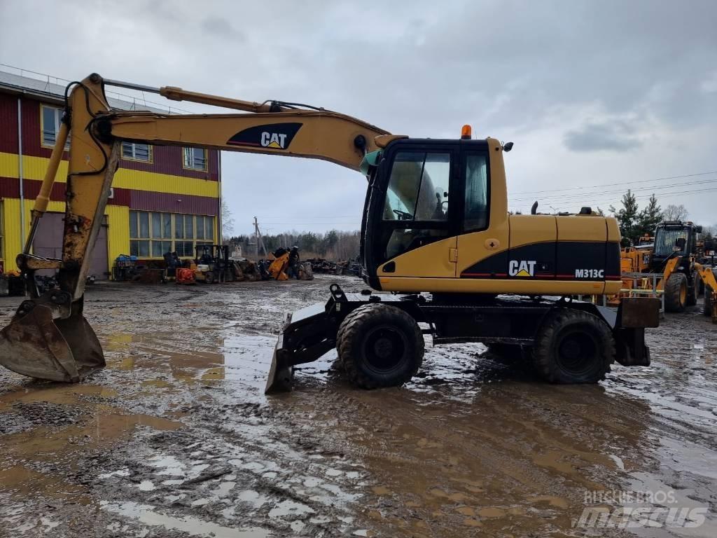 CAT M 313 C Pelle sur pneus