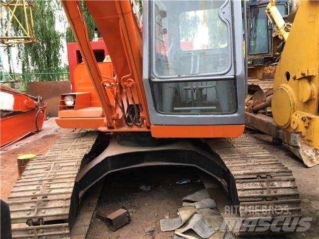 Hitachi EX 100 Pelle sur chenilles