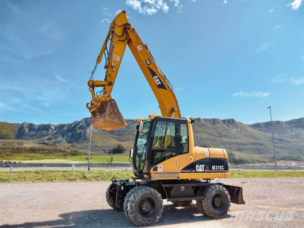 CAT M 313 C Pelle sur pneus