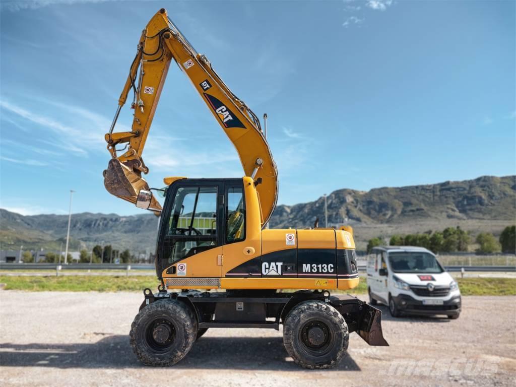 CAT M 313 C Pelle sur pneus