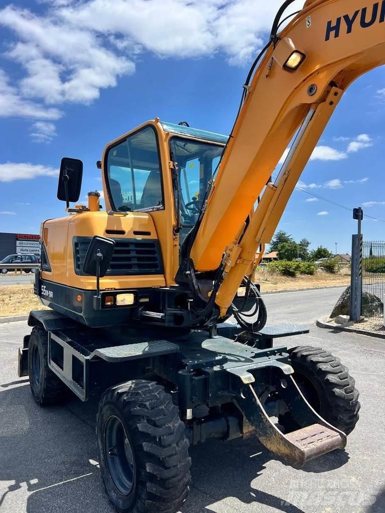 Hyundai R55W-9A Pelle sur pneus