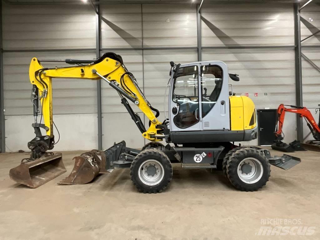 Neuson EW 100 Pelle sur pneus