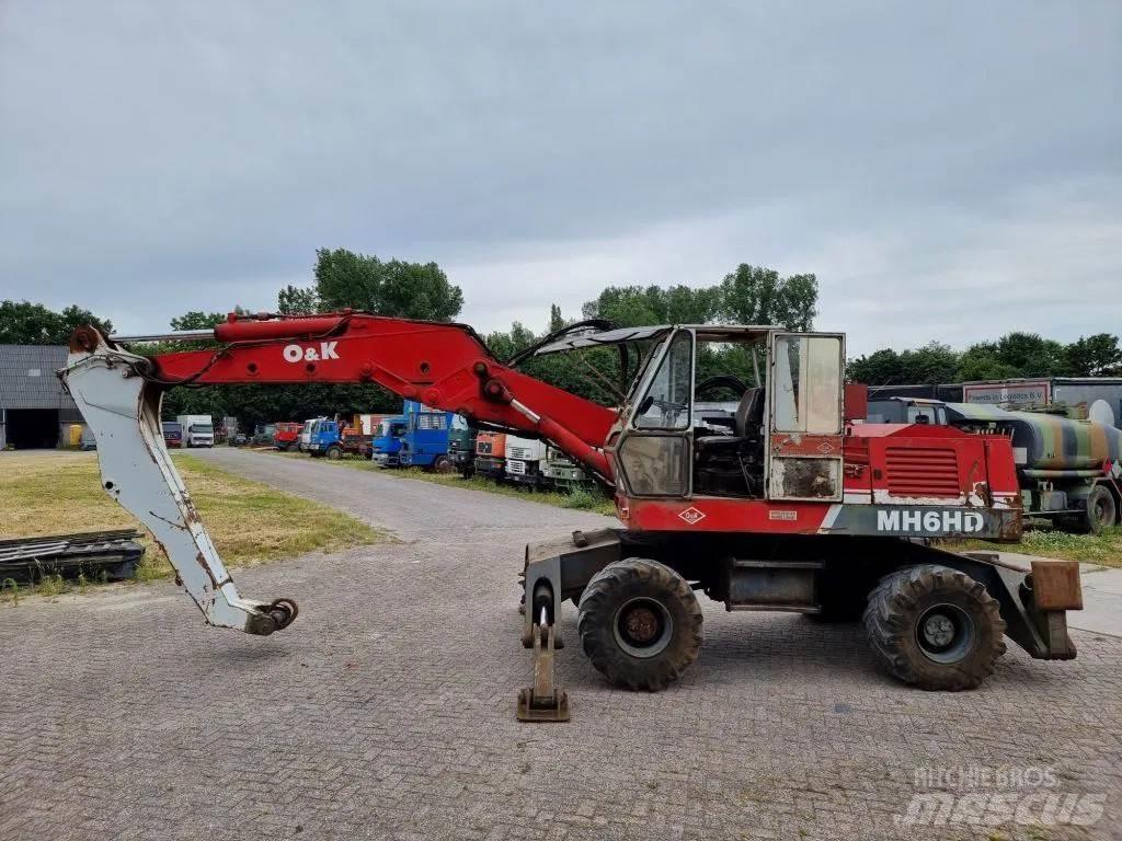 O&K MH6HD Pelle sur pneus