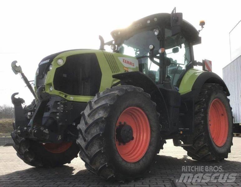 CLAAS AXION 810 Tracteur