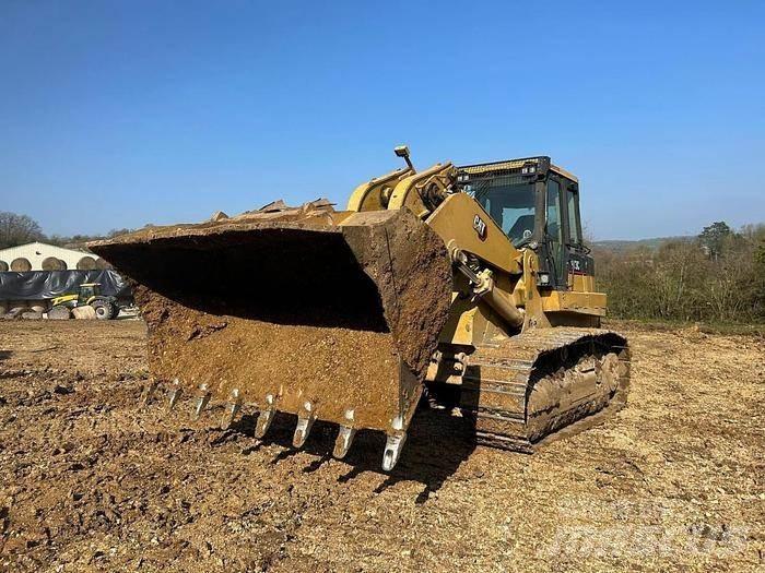 CAT 973C - Pelle spéciale