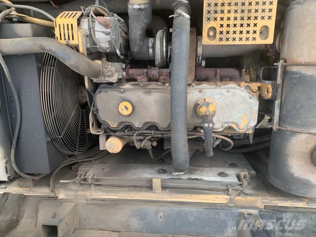 CAT M 325 C L MH Pelle à déchets