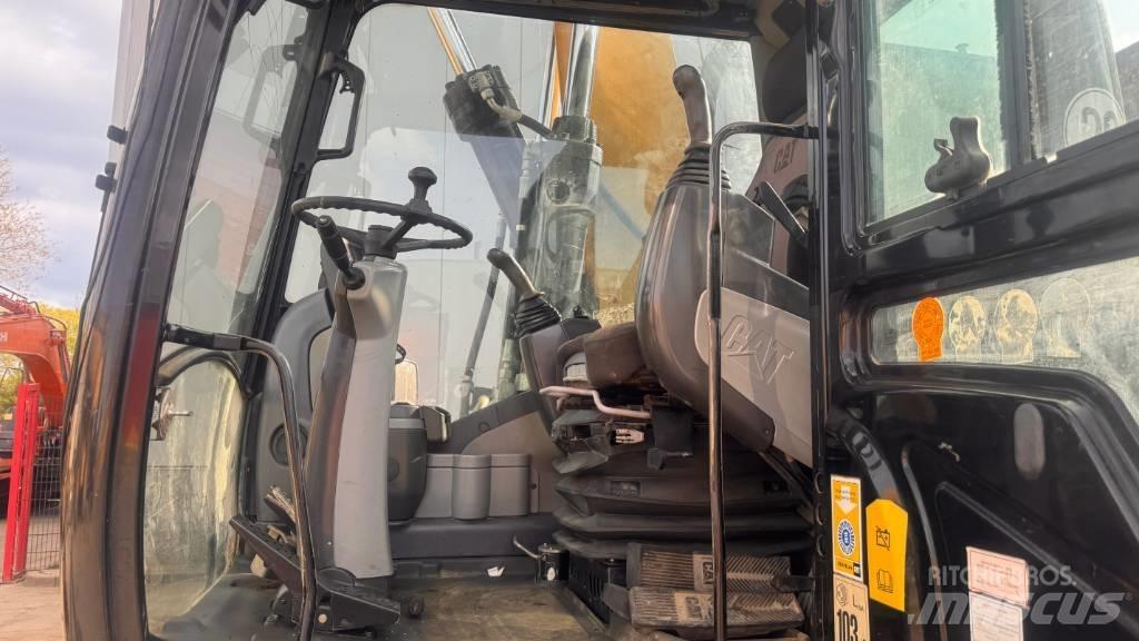 CAT M 316 D Pelle sur pneus
