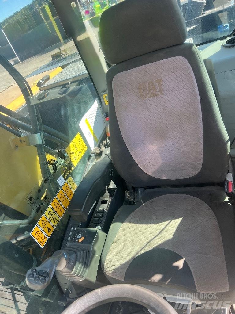 CAT M314F Pelle sur pneus