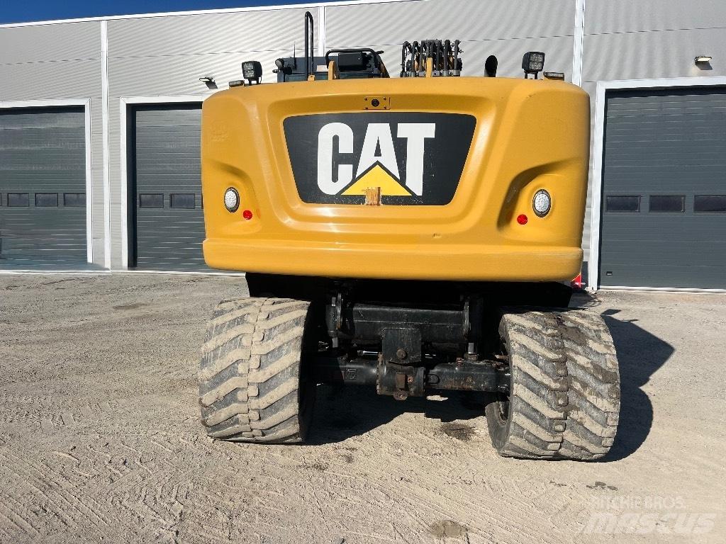 CAT M314F Pelle sur pneus