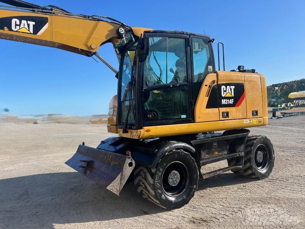 CAT M314F Pelle sur pneus