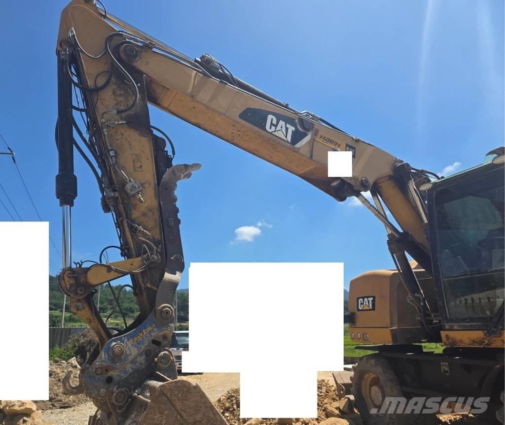 CAT 314F Pelle sur pneus