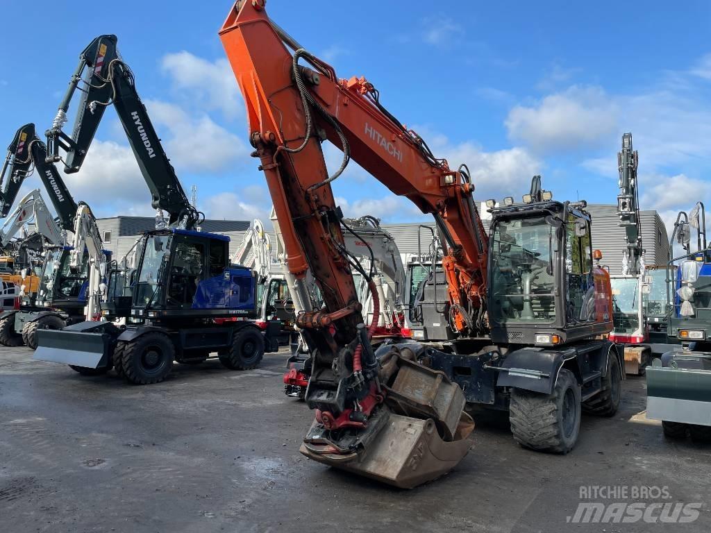 Hitachi 140W-6 Pelle sur pneus