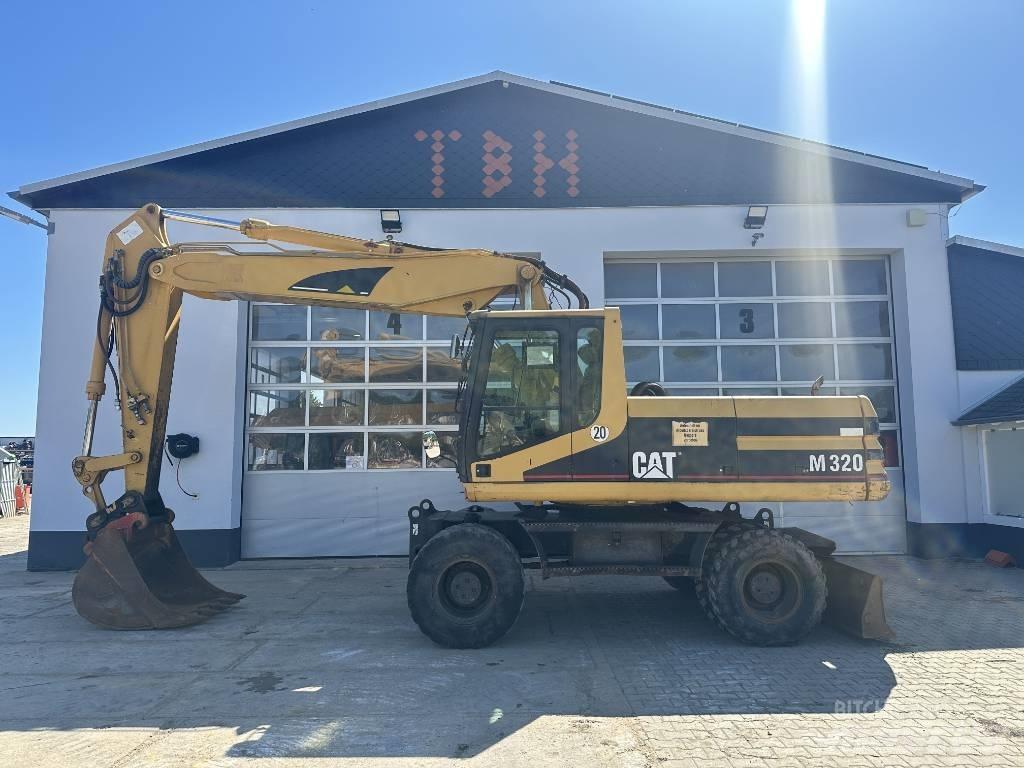 CAT M 320 VAH Pelle sur pneus
