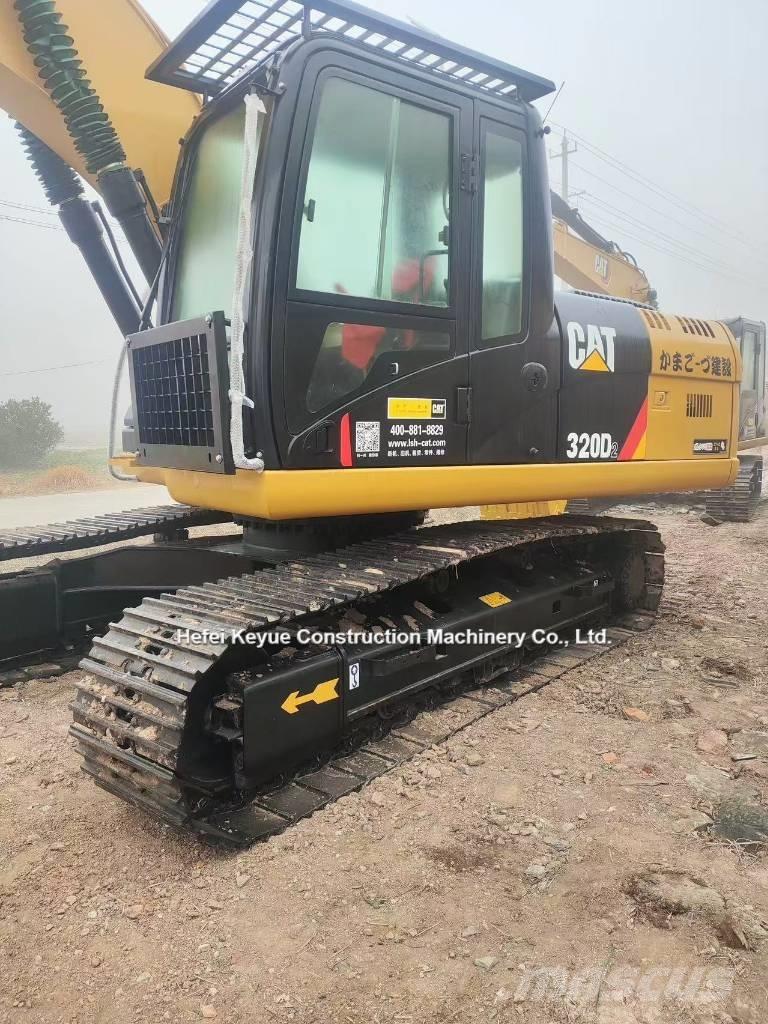 CAT 323 Pelle sur chenilles