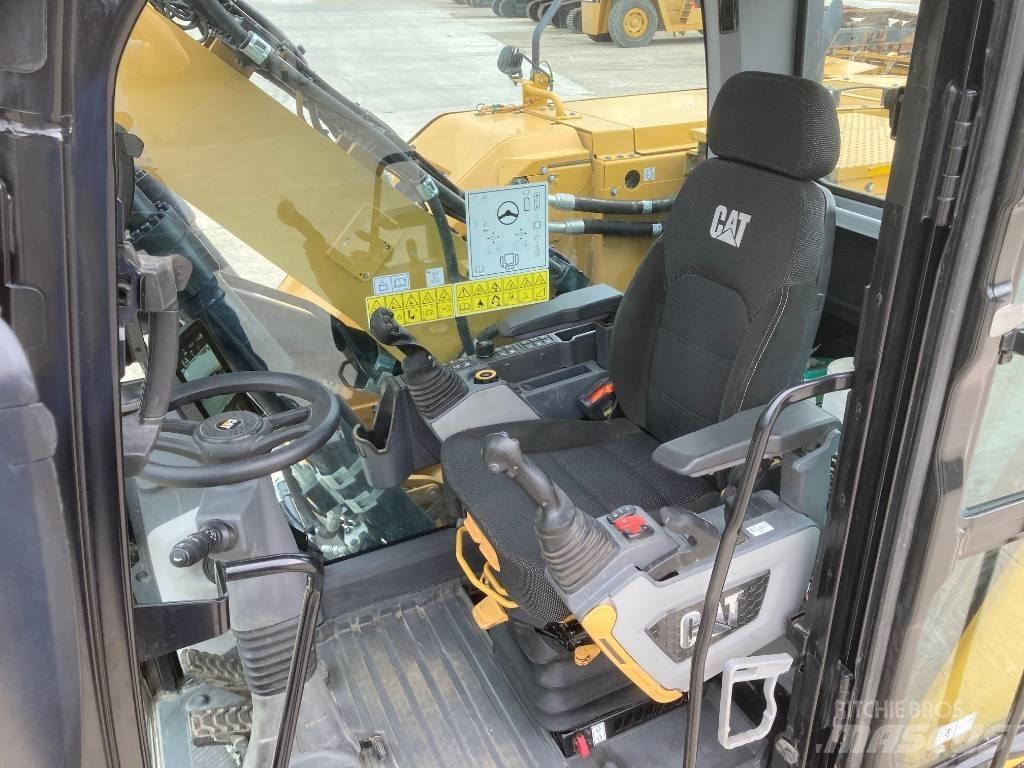 CAT M314 Pelle sur pneus
