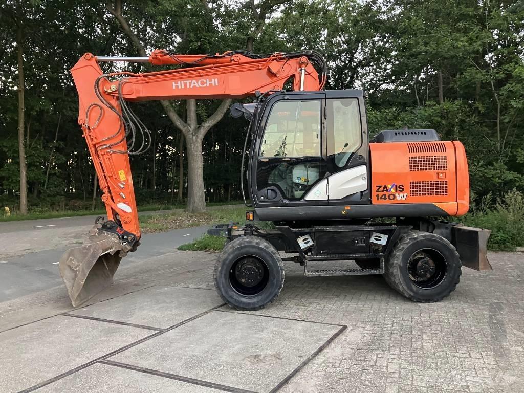 Hitachi ZX140-5B Pelle sur pneus