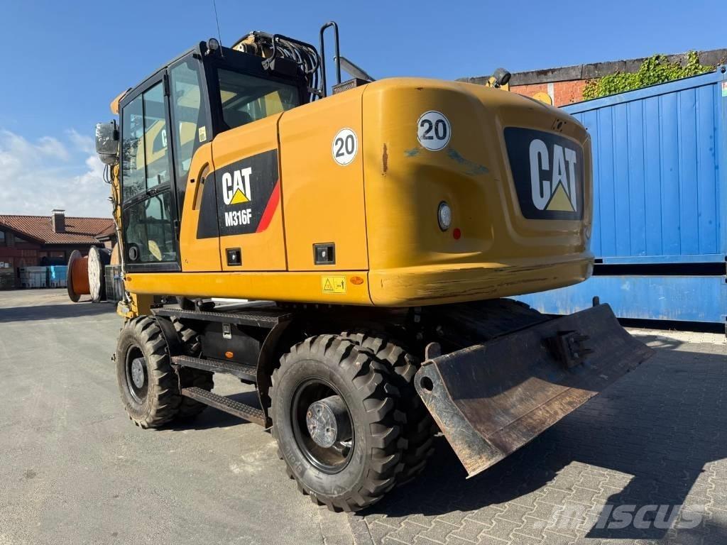 CAT M 316F Pelle sur pneus