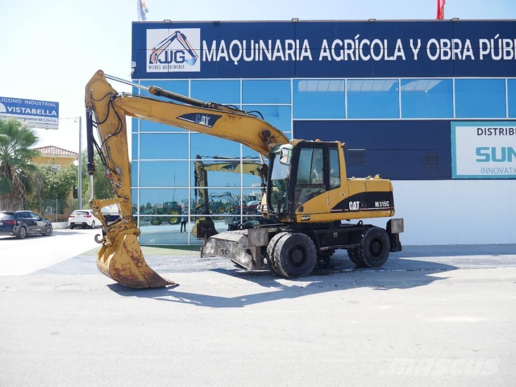 CAT M 315 C Pelle sur pneus