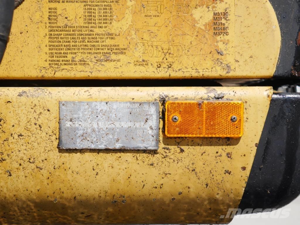 CAT M 315 C Pelle sur pneus