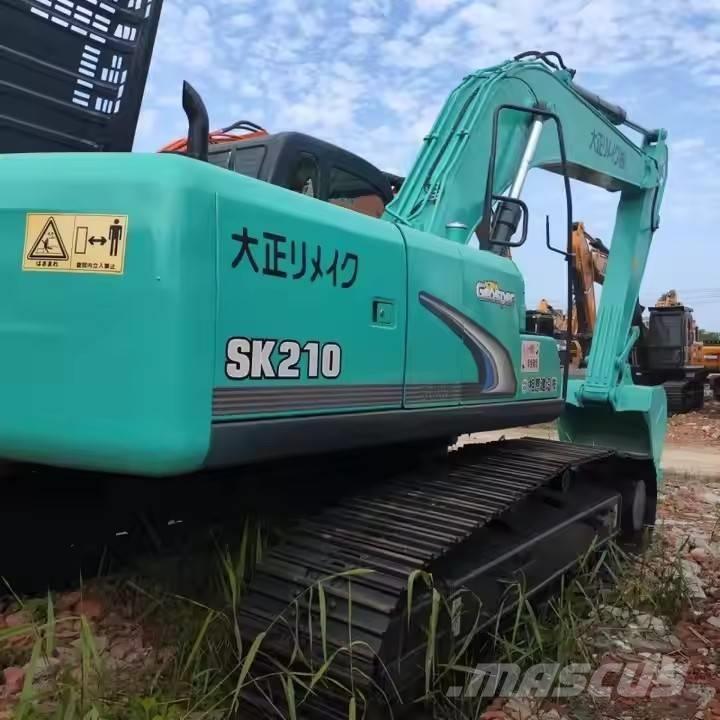 Kobelco SK 210 Pelle sur chenilles