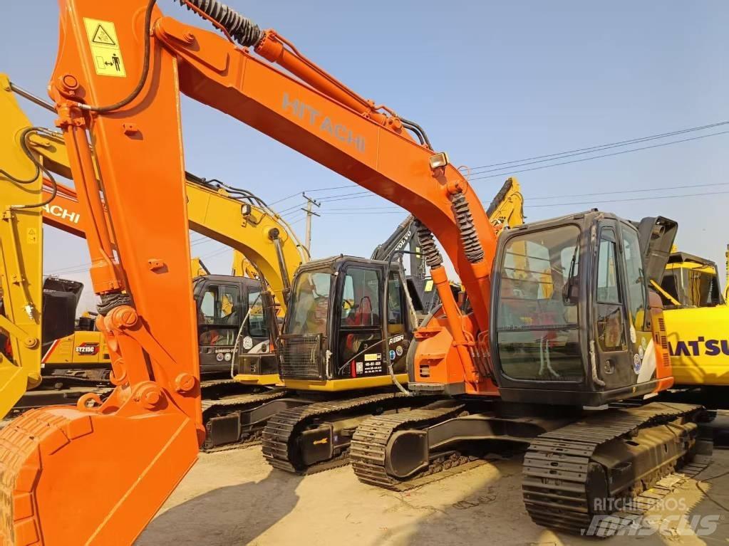 Hitachi ZX135 Pelle sur chenilles