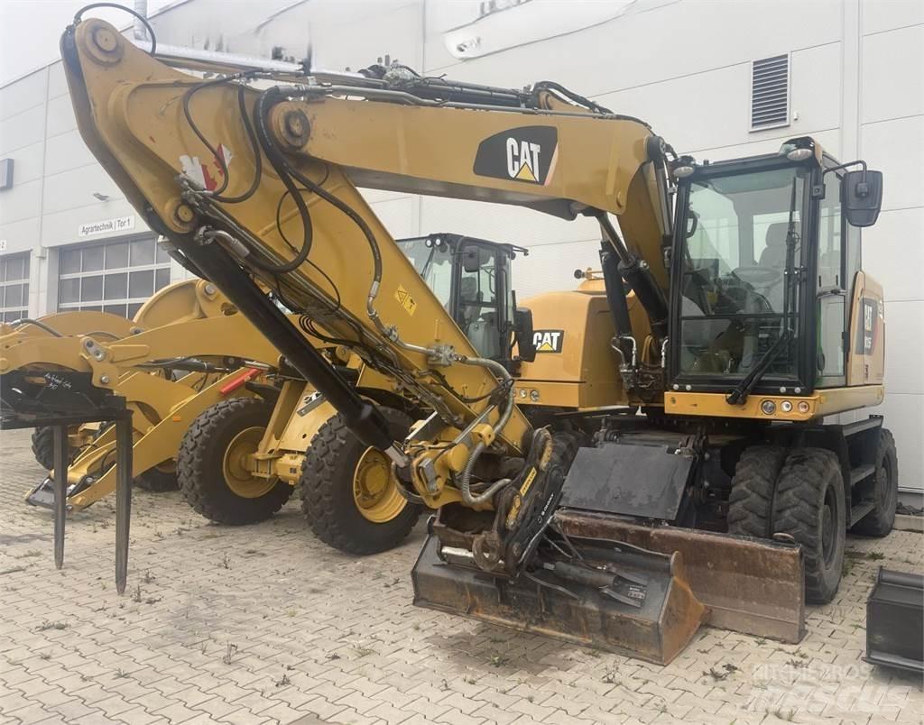 CAT M315 F Pelle sur pneus
