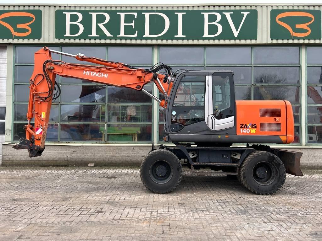 Hitachi ZX 140 W Pelle sur pneus