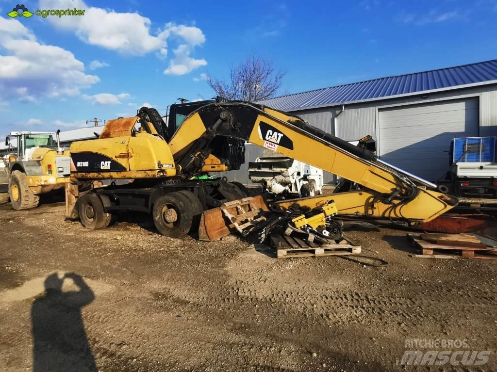 CAT M 318 D Pelle à déchets