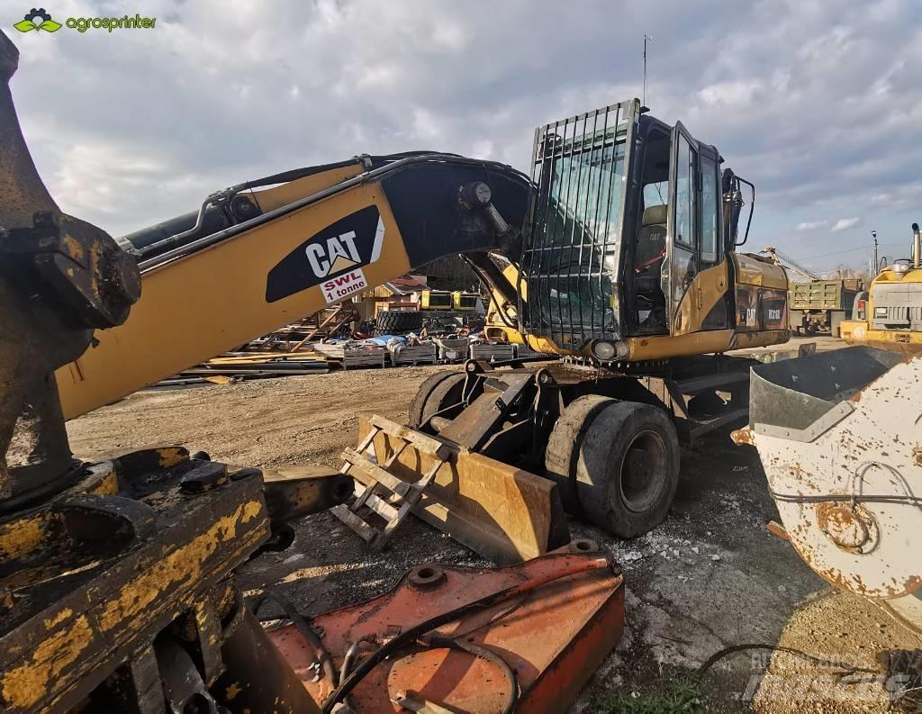 CAT M 318 D Pelle à déchets