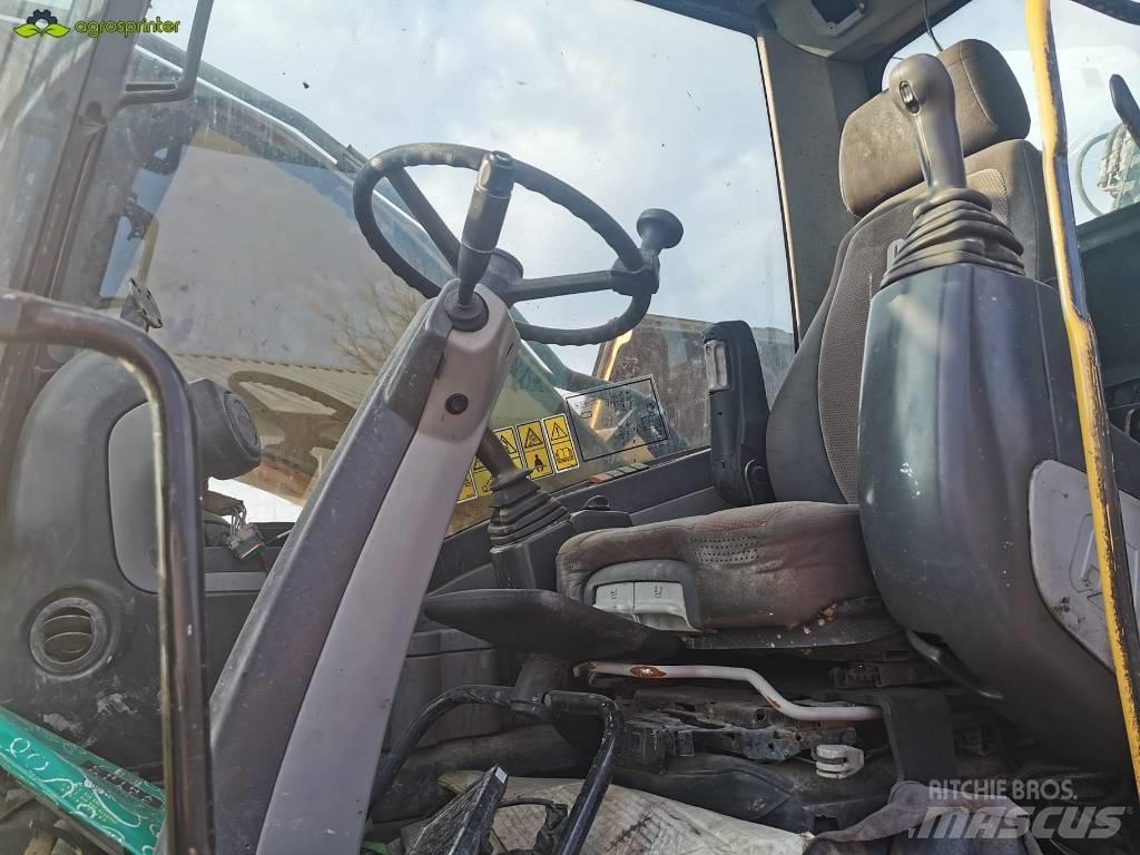 CAT M 318 D Pelle à déchets