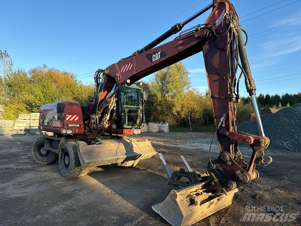 CAT 313 D Pelle sur pneus