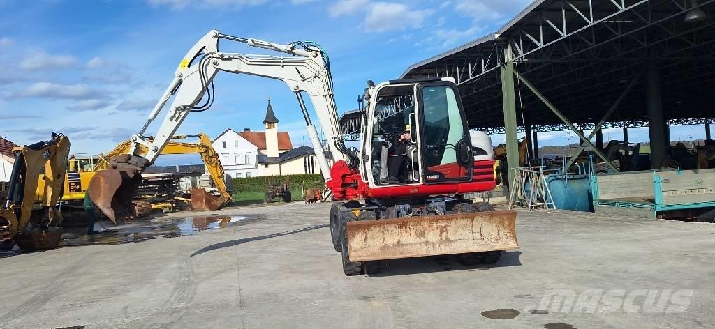 Takeuchi TB 295 W Pelle sur pneus