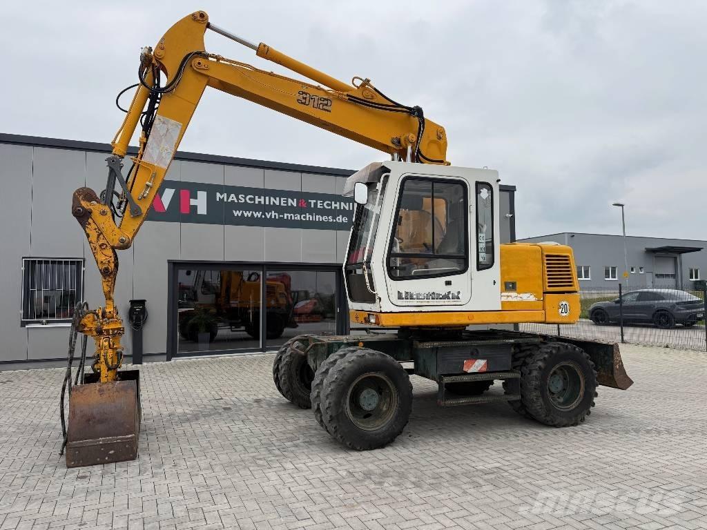 Liebherr A 312 Pelle sur pneus
