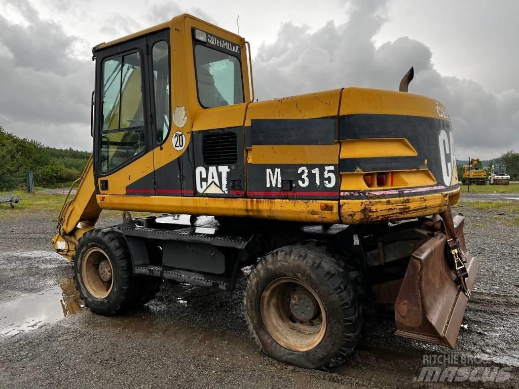 CAT FOR PARTS M 315 Pelle sur pneus