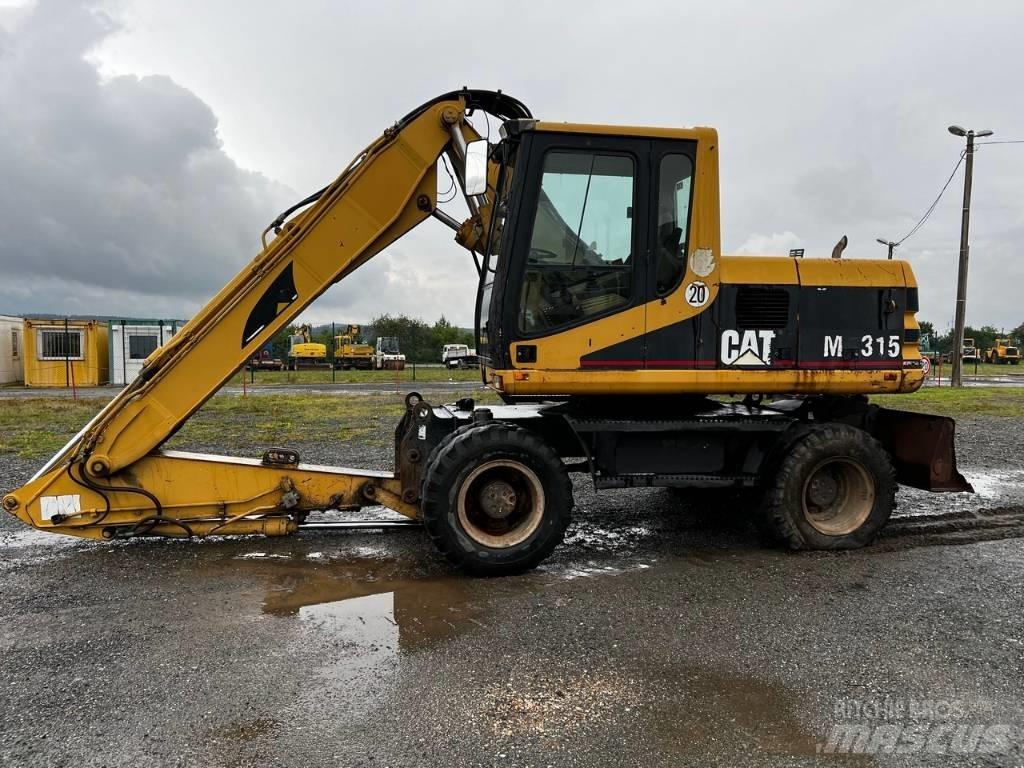 CAT FOR PARTS M 315 Pelle sur pneus