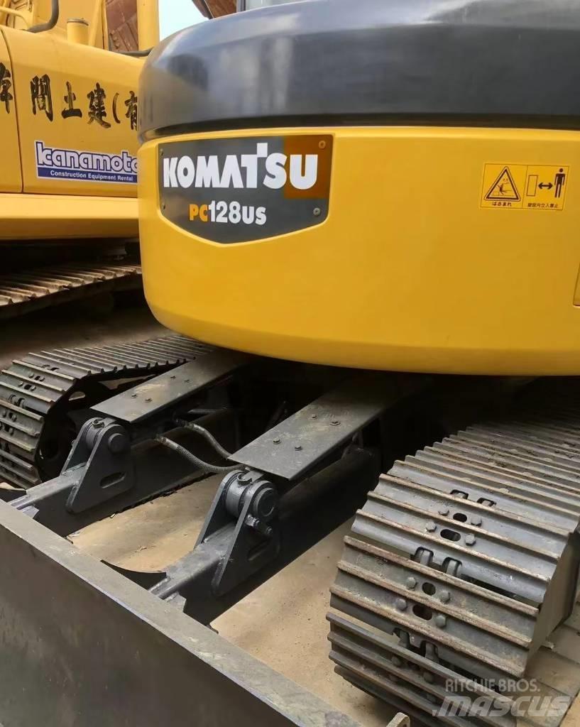 Komatsu 128 US Pelle sur chenilles