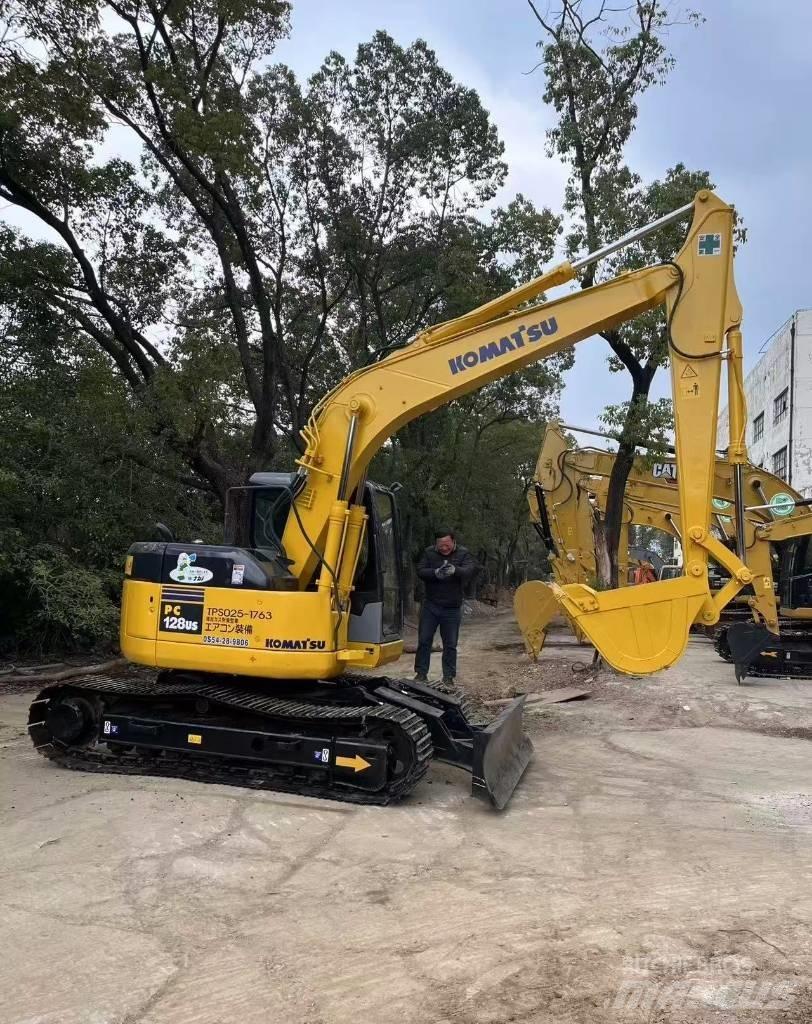 Komatsu 128 US Pelle sur chenilles