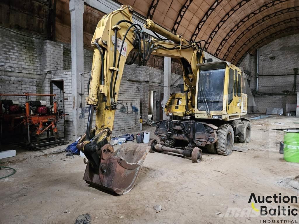 Atlas 1604 Pelle sur pneus