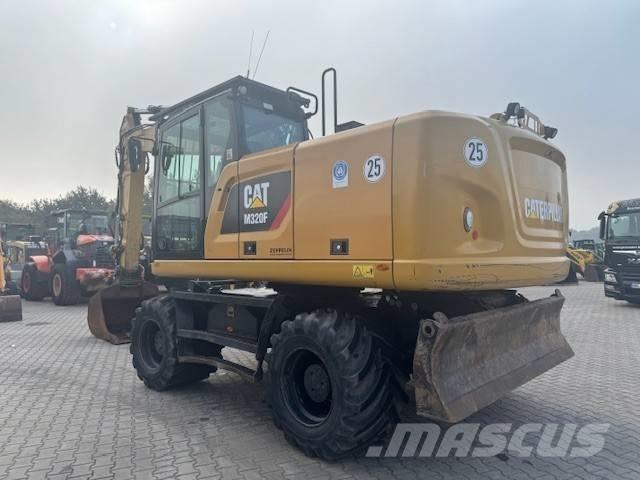 CAT M 320 F Pelle sur pneus