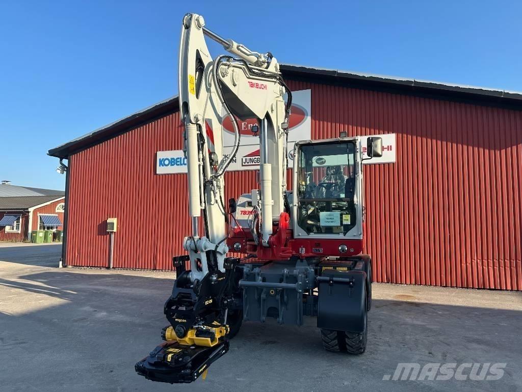 Takeuchi TB 395 W Pelle sur pneus