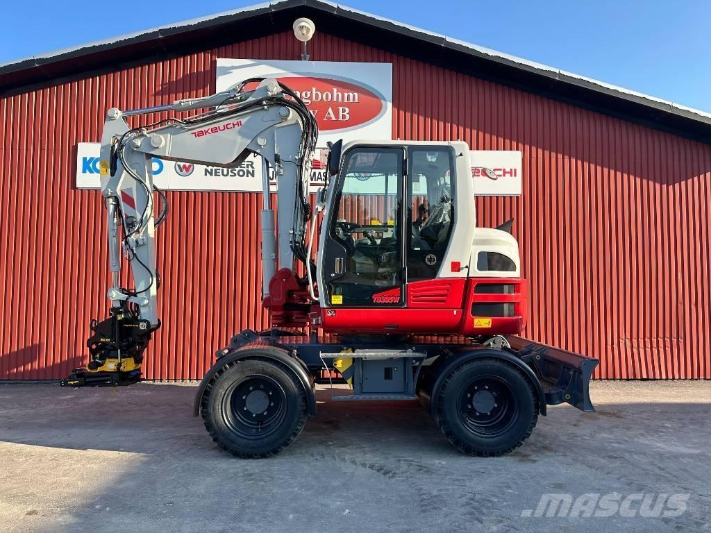 Takeuchi TB 395 W Pelle sur pneus