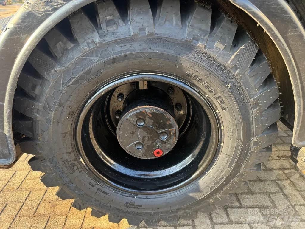 CAT M315F Pelle sur pneus