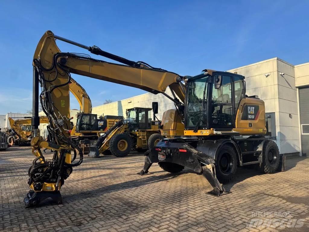 CAT M315F Pelle sur pneus
