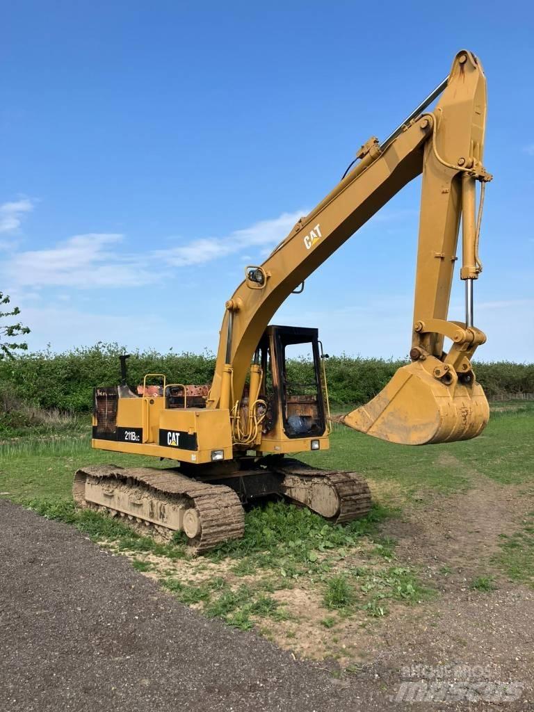 CAT 211 B LC Pelle sur chenilles