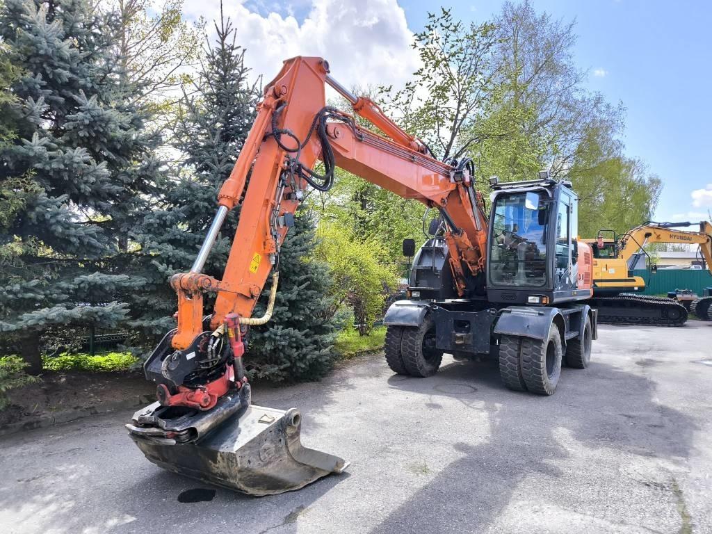 Hitachi ZX 140 W-3 Pelle sur pneus