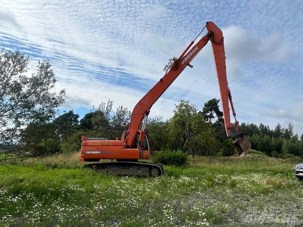 Doosan DX 225 LC Pelle longue portée