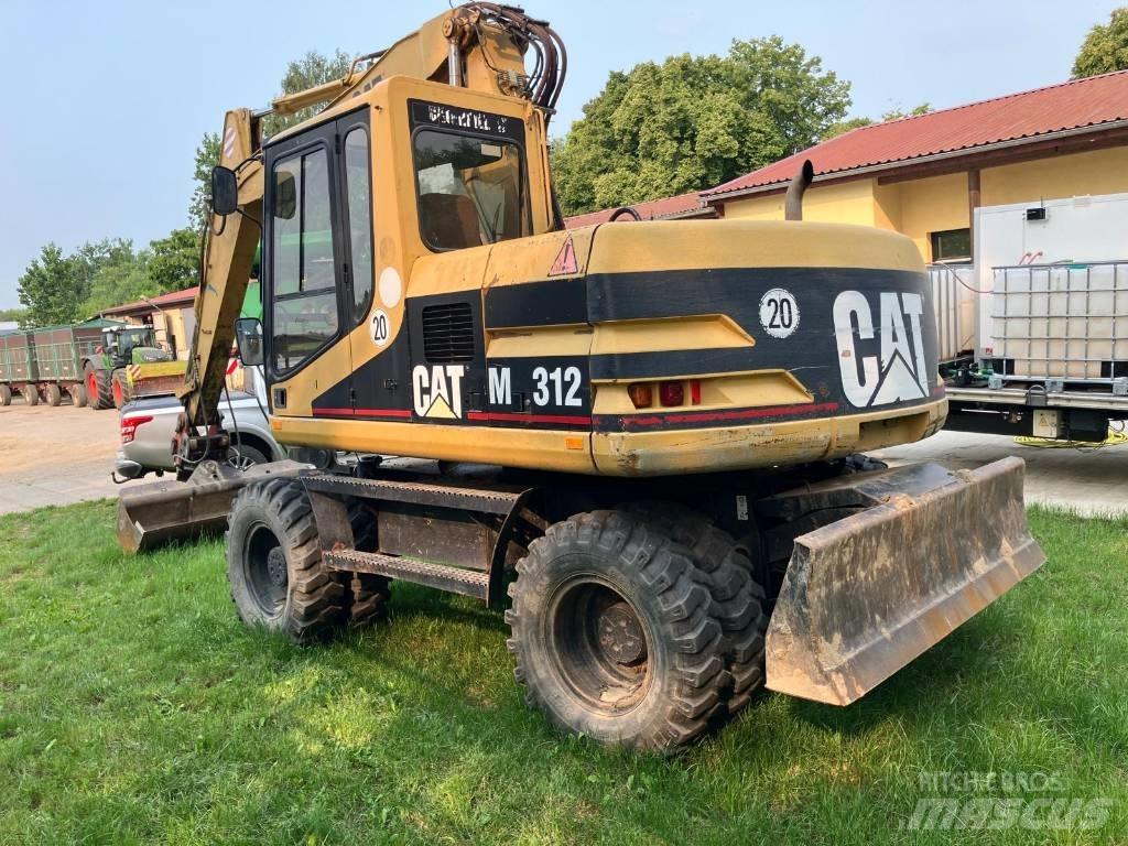 CAT M 312 Pelle sur pneus