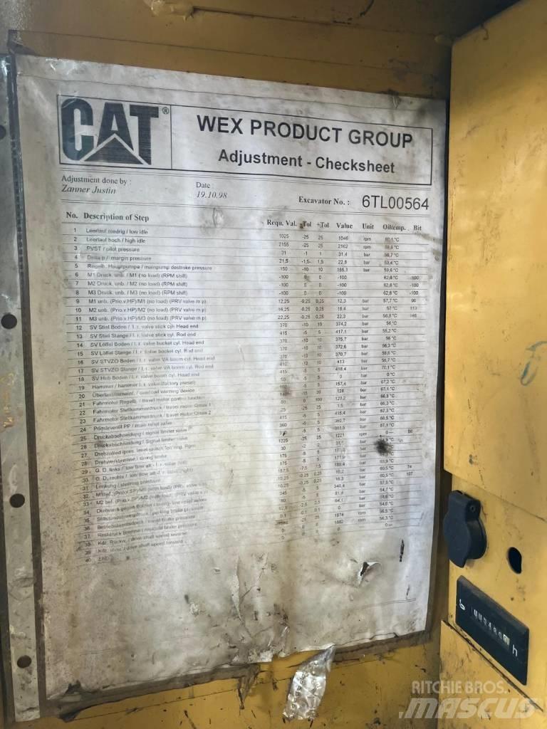 CAT M 312 Pelle sur pneus