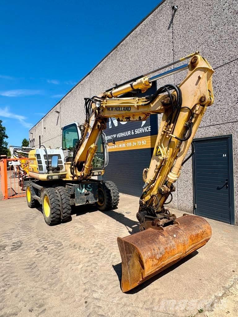 New Holland MH 2.6 Pelle sur pneus