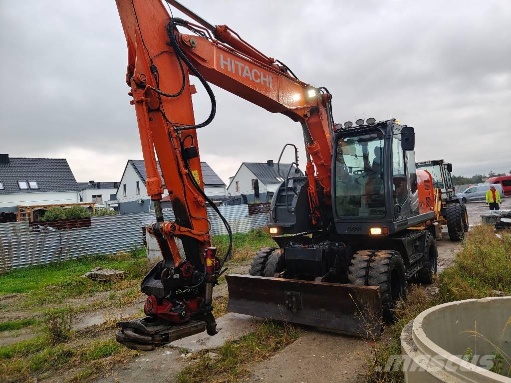 Hitachi ZX 140 W-5 Pelle sur pneus